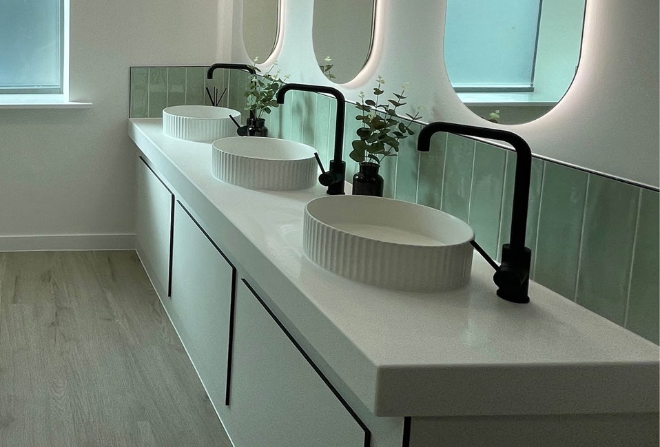 Venesta Washrooms Case Study Air Charter Service Solid Surface Vanity Unit Detail1